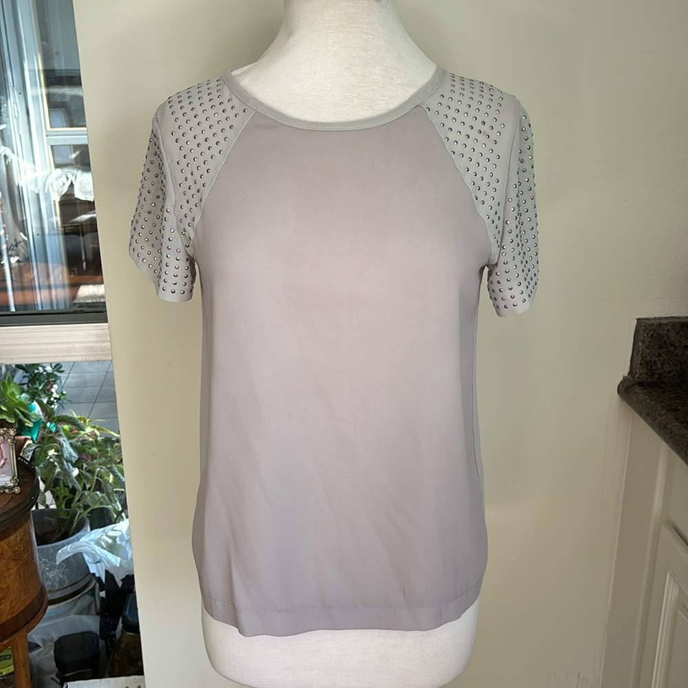OVI shirt , size small.   Detailed with studs on the sleeves
